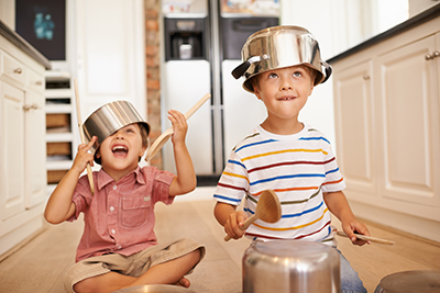 kids playing on kitchen floor